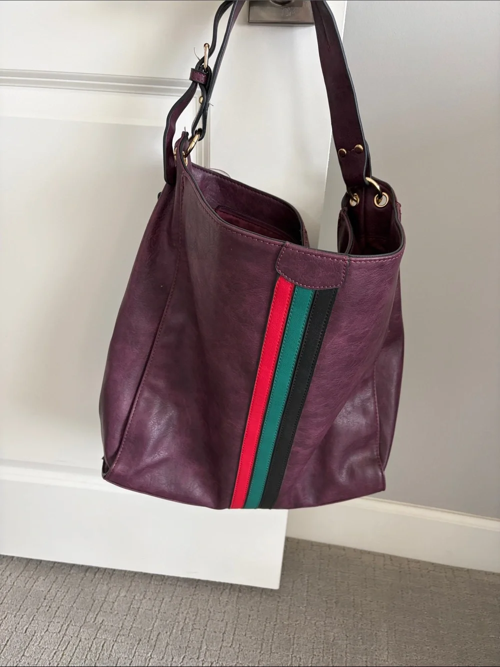 Large Burgundy leather bag with red and green accents